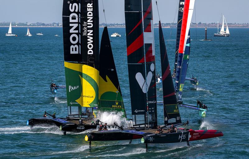 Switzerland SailGP Team and BONDS Flying Roos SailGP Team  race behind USA SailGP Team and France SailGP Team  on Race Day 2 of the DP World Spain Sail Grand Prix held in Cadiz photo copyright Jason Ludlow for SailGP taken at  and featuring the F50 class