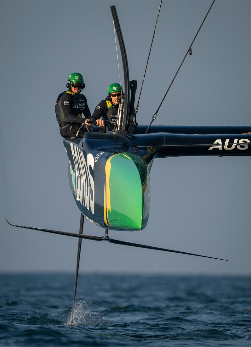 Tom Slingsby, driver of BONDS Flying Roos SailGP Team, behind the wheel alongside Sam Newton, grinder of BONDS Flying Roos SailGP Team, on the grinding handles during a practice session ahead of the Mubadala Abu Dhabi Sail Grand Prix Season Grand Final - photo © Ricardo Pinto for SailGP