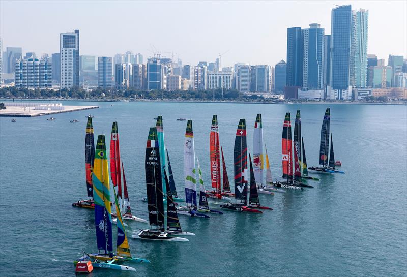 The SailGP F50 catamaran fleet cross the start line on Race Day 1 of the Mubadala Abu Dhabi Sail Grand Prix Season Grand Final presented by Abu Dhabi Sports Council - photo © Felix Diemer for SailGP