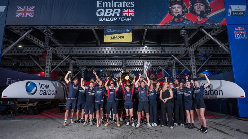 Emirates Great Britain SailGP Team and shore crew celebrate with the Impact League trophy, Golden Wheel Trophy and Rolex SailGP Championship trophy at their Hanger in the SailGP technical area after winning the Sail Grand Prix Season Championship photo copyright Andrew Baker for SailGP taken at  and featuring the F50 class