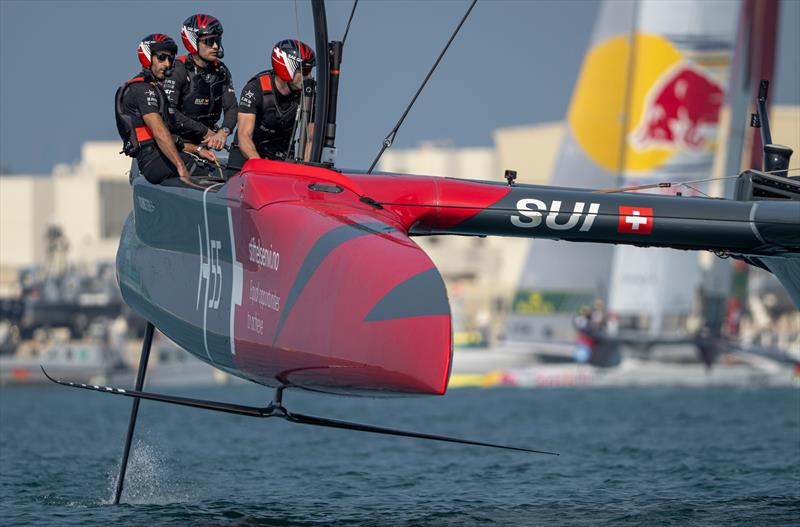 Sebastien Schneiter, driver of Switzerland SailGP Team, controls the wheel of the F50 catamaran on Race Day 2 of the Mubadala Abu Dhabi Sail Grand Prix Season Grand Final presented by Abu Dhabi Sports Council photo copyright Ricardo Pinto for SailGP taken at  and featuring the F50 class