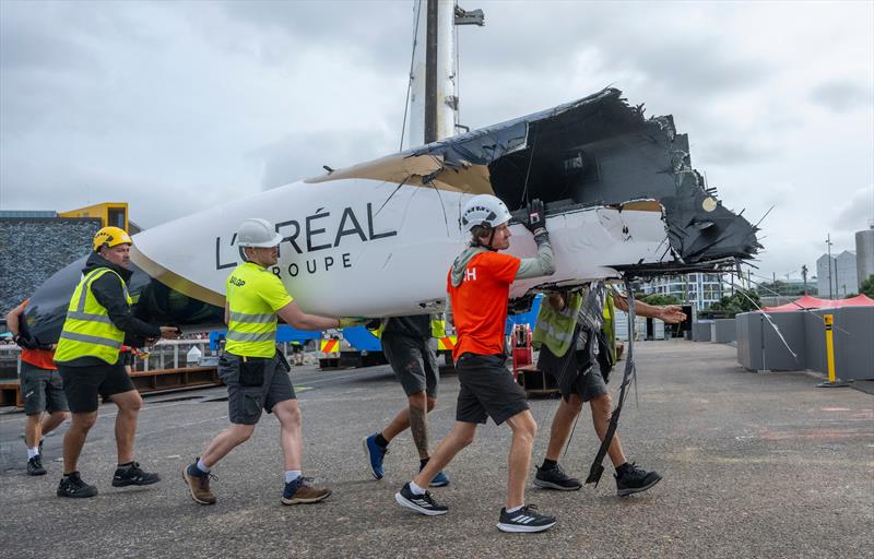 Wreckage from the DS Automobiles SailGP Team France F50 catamaran is moved in the technical area after a collision with Black Foils SailGP Team during racing on Race Day 1 of the ITM New Zealand Sail Grand Prix in Auckland, New Zealand - photo © James Gourley for SailGP