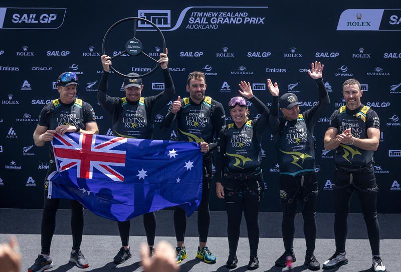 BONDS Flying Roos SailGP Team celebrate on the podium with the winner wheel following winning the event on Race Day 2 of the ITM New Zealand Sail Grand Prix in Auckland, New Zealand - photo © Felix Diemer for SailGP