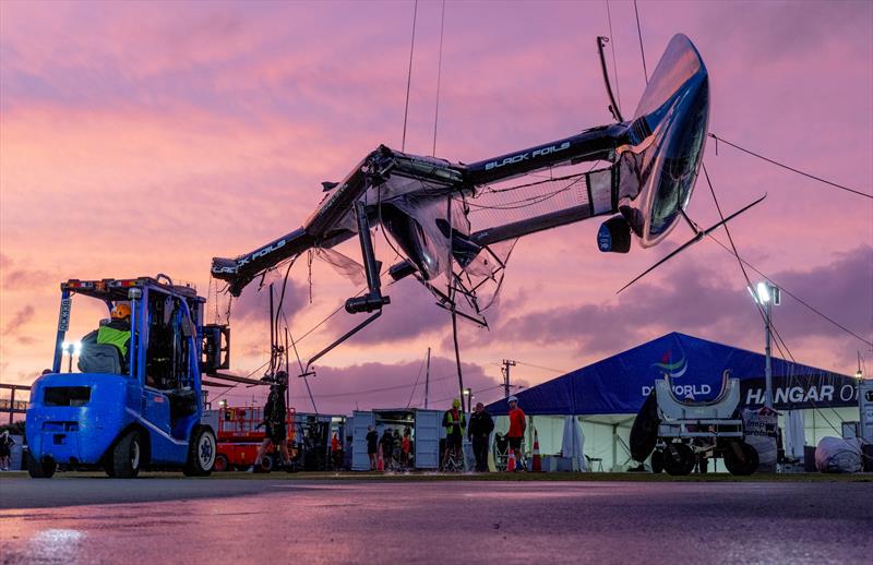 The damaged Black Foils SailGP Team F50 catamaran is craned out of the water on Race Day 1 of the ITM New Zealand Sail Grand Prix in Auckland, New Zealand - photo © Felix Diemer for SailGP