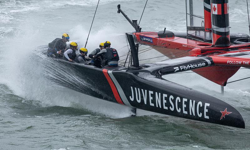 Giles Scott, driver of NORTHSTAR SailGP Team, controls the wheel as waves crash into the F50 catamaran whilst in action on Race Day 2 of the ITM New Zealand Sail Grand Prix in Auckland, New Zealand photo copyright Iain McGregor for SailGP taken at  and featuring the F50 class