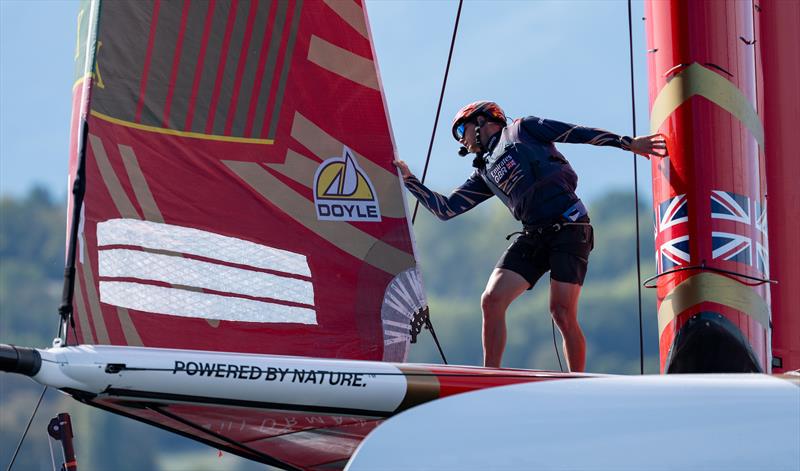 Luke Parkinson, flight controller of Emirates Great Britain SailGP Team, crosses the boat during a manoeuvre on Race Day 1 of the Switzerland Sail Grand Prix in Geneva, Switzerland photo copyright Jason Ludlow for SailGP taken at  and featuring the F50 class
