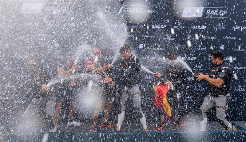 The Los Gallos SailGP Team driven by Diego Botin celebrate on the podium with Barons De Rothschild Champagne during the presentation ceremony after winning the final race on Race Day 2 of the Switzerland Sail Grand Prix in Geneva, Switzerland photo copyright Jason Ludlow for SailGP taken at  and featuring the F50 class