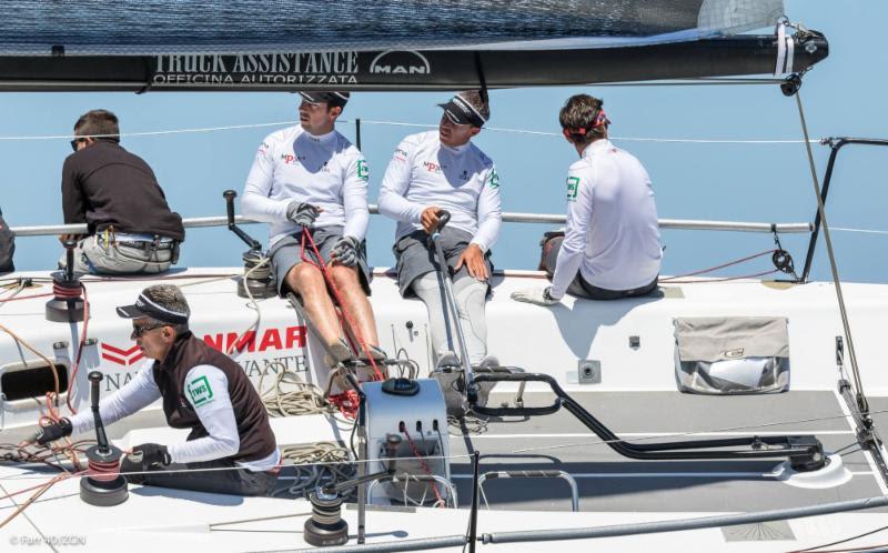 Luca Pierdomenico at the helm with brothers Francesco (Main Trim) and Armando (Jib/Spinnaker Trim) at Rolex Capri Sailing Week - photo © Farr 40 / ZGN