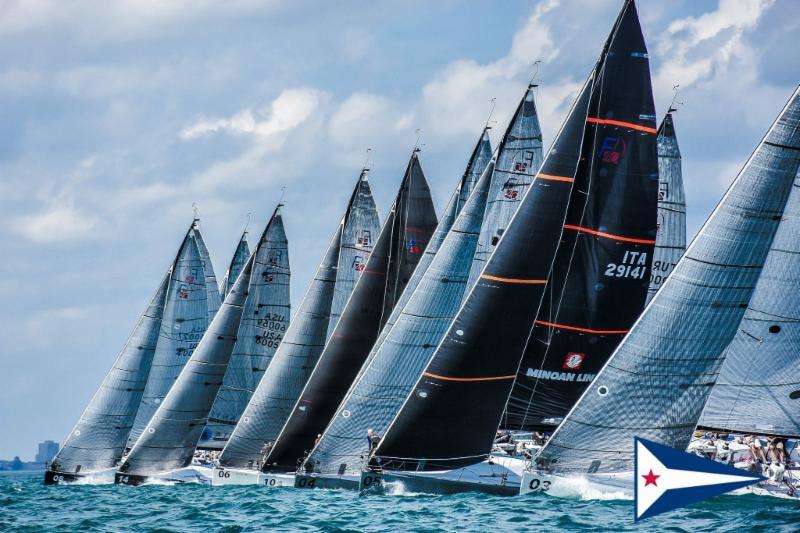 The fleet of 14 boats comes off the  starting line in close proximity during the Farr 40 Pre-Worlds, held Wednesday out of the Chicago Yacht Club Belmont Station photo copyright Chicago Yacht Club taken at Chicago Yacht Club and featuring the Farr 40 class