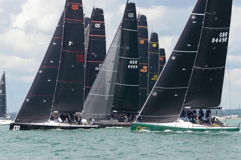 Rebellion (green hull) holds her own in the FAST 40  fleet to tie first place on day 1 of the Vice Admiral's Cup photo copyright Rick Tomlinson / www.rick-tomlinson.com taken at Royal Ocean Racing Club and featuring the Fast 40 class