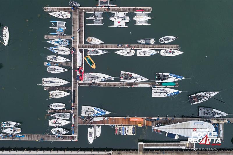 Fast 40 class leave the dock on day 1 of the International Paint Poole Regatta 2018 photo copyright Ian Roman / International Paint Poole Regatta taken at  and featuring the Fast 40 class