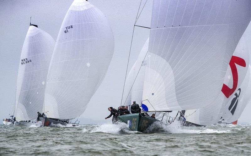 Stewart Whitehead's Rebellion leads the charge downwind photo copyright Richard Langdon taken at  and featuring the Fast 40 class