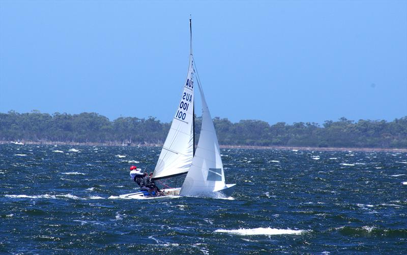 Waves roll over Freight Train AUS001 as Matt Draper and Thomas Stuchbery aim her towards the windward gates in race six, for the Flying Dutchman 2026 Australian championship, held at Metung, Victoria, Australia photo copyright Jeanette Severs taken at Metung Yacht Club and featuring the Flying Dutchman class