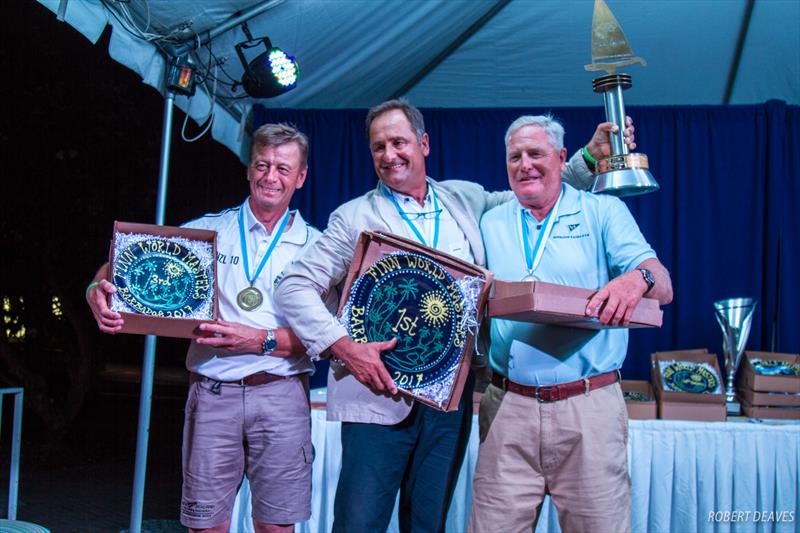 Grand Grand Masters: 3. David Hoogenboom, NZL: 1. Marc Allain des Beauvais, FRA; 2. Rob Coutts, USA at the 2017 Finn World Masters in Barbados prize giving photo copyright Robert Deaves taken at Barbados Yacht Club and featuring the Finn class
