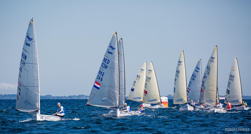 Fleet still tight at the finish of the Finn class Medal Race at the 2018 Hempel Sailing World Championships Aarhus photo copyright Robert Deaves taken at Sailing Aarhus and featuring the Finn class