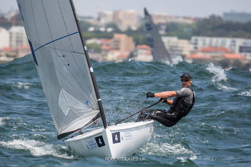 2021 Finn Gold Cup day 4: Josh Junior, NZL photo copyright Robert Deaves taken at Vilamoura Sailing and featuring the Finn class