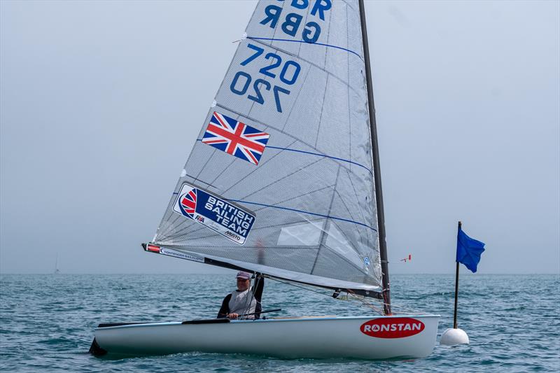 Mengeham Rythe's Julian Smith crosses first in Race 6 of the British Finn Nationals at Torbay photo copyright Tania Hutchings / www.50northphotography.co.uk taken at Royal Torbay Yacht Club and featuring the Finn class