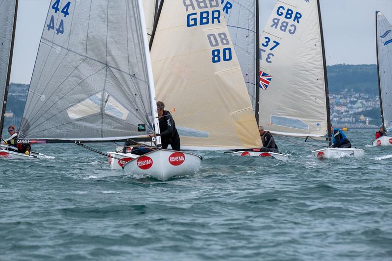 Downwind free pumping frenzy during the British Finn Nationals at Torbay photo copyright Tania Hutchings / www.50northphotography.co.uk taken at Royal Torbay Yacht Club and featuring the Finn class