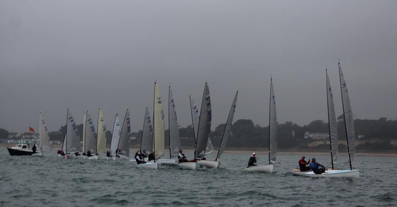 Finn Travellers at Highcliffe photo copyright Sarah Desjonqueres taken at Highcliffe Sailing Club and featuring the Finn class