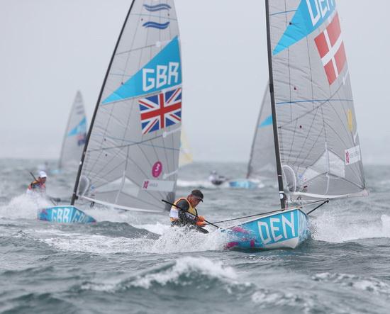 Finns on day three of the London 2012 Olympic Sailing Competition photo copyright Francois Richard taken at Weymouth & Portland Sailing Academy and featuring the Finn class