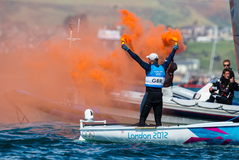 Ben Ainslie wins a historic fourth gold medal at the London 2012 Olympic Sailing Competition photo copyright Tom Gruitt / www.tom-gruitt.co.uk taken at Weymouth & Portland Sailing Academy and featuring the Finn class