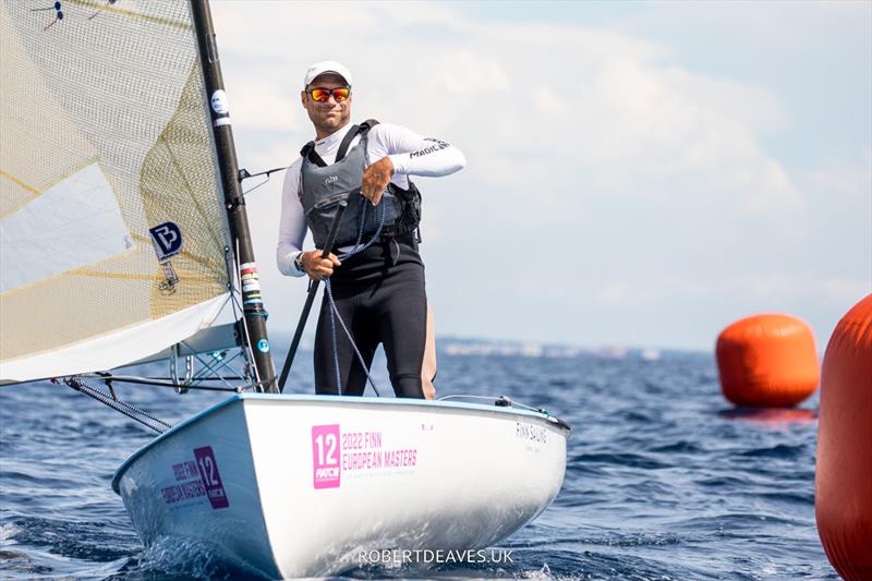 Sinan Sumer, TUR - Open Finn European Masters day 3 photo copyright Robert Deaves taken at Club Nàutic Hospitalet-Vandellòs and featuring the Finn class