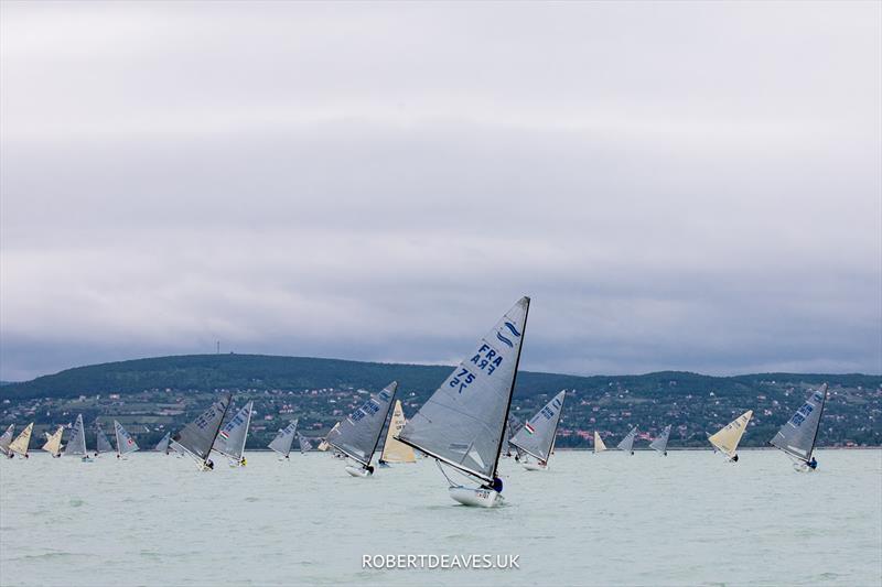 Race 10 at the 2023 Open and U23 Finn Europeans in Csopak, Hungary photo copyright Robert Deaves / www.robertdeaves.uk taken at Procelero Sportegyesület and featuring the Finn class