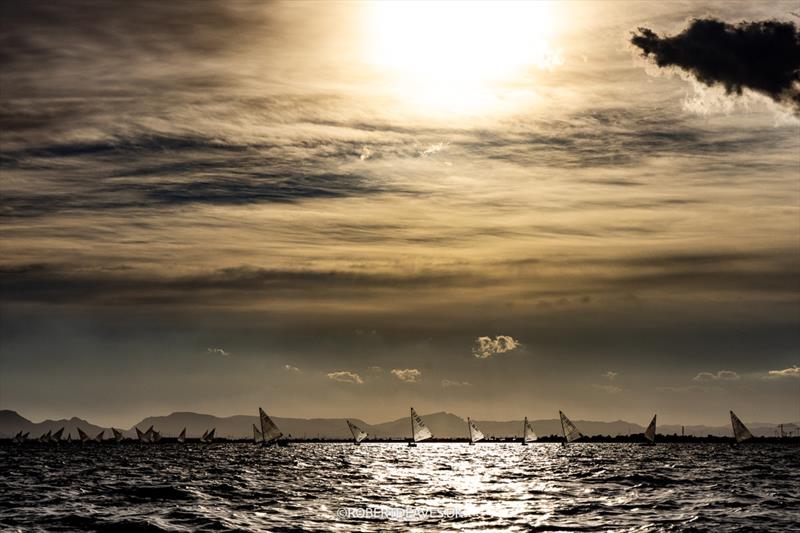 Sunset finish on day 2 of the 2026 Finn European Masters at Los Alcazares - photo © Robert Deaves / www.robertdeaves.uk