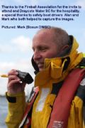 Mike Shaw thanks the safety boat drivers Alan and Mark at the Fireball Inland Championships