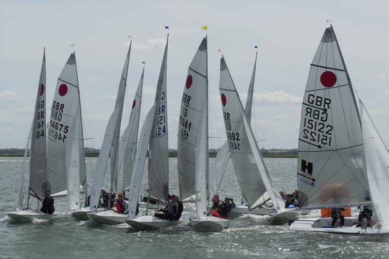 Day 1 of the Fireball Open Meeting at Blackwater SC photo copyright Chris Nichols taken at Blackwater Sailing Club and featuring the Fireball class