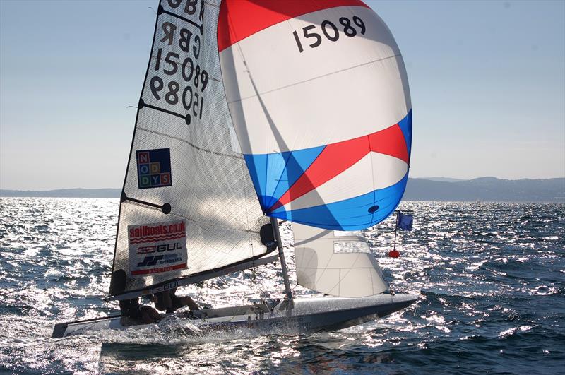 Jonny McGovan and new crew Max Todd doing what is says on the box on day 1 of the Gul UK Fireball Nationals photo copyright David Henshall taken at Plas Heli Welsh National Sailing Academy and featuring the Fireball class