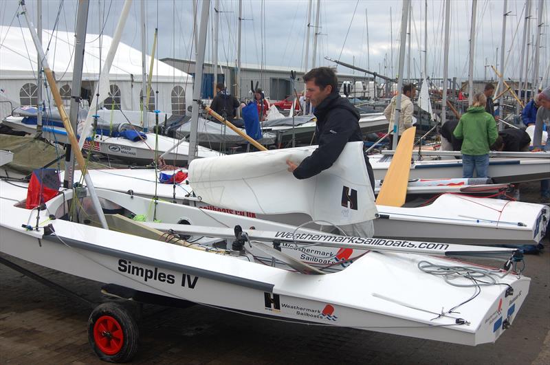 David Hall rigs in preparation for day 4 at the Gul UK Fireball Nationals photo copyright David Henshall taken at Plas Heli Welsh National Sailing Academy and featuring the Fireball class