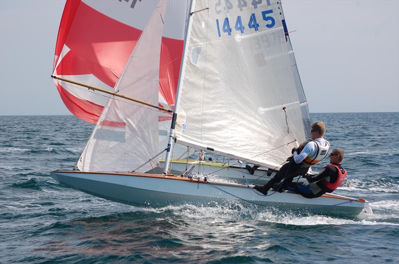 Milne's brilliance was to create a scow hull form that enjoyed a reasonably modest surface wetted area for a boat with a flat panel that ran from bow to stern photo copyright D Henshall taken at  and featuring the Fireball class