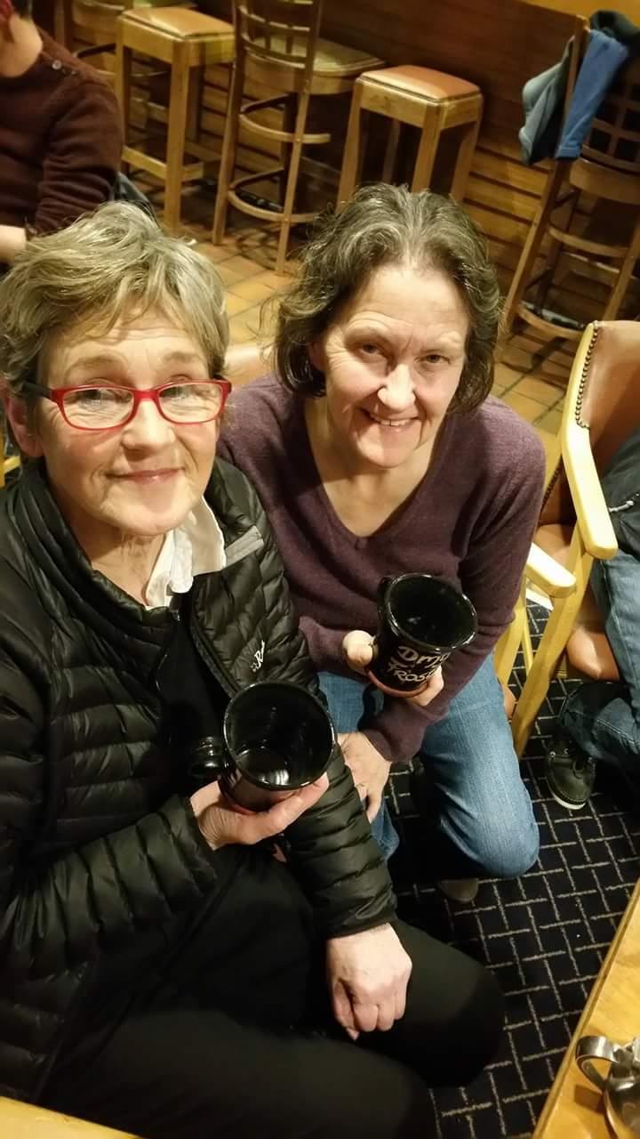 Brenda McGuire and Mary Chambers win their Dun Laoghaire Fireball Frostbite mugs photo copyright Frank Miller taken at Dun Laoghaire Motor Yacht Club and featuring the Fireball class