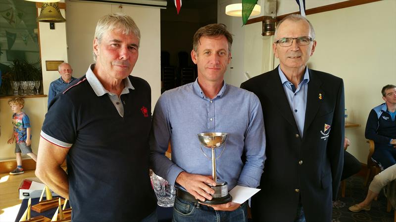 Winning helm – Noel Butler (centre) with Neil Cramer (Fireball Class Chairman & Skerries SC Treasurer) and Skerries SC Commodore Kieran Brannagan at the Irish Fireball Leinsters photo copyright Frank Miller taken at Skerries Sailing Club and featuring the Fireball class