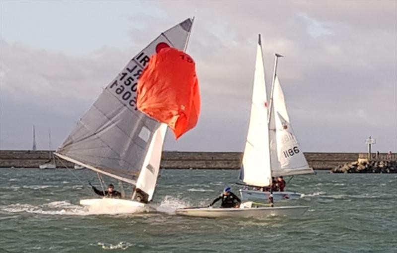 Look behind you! The Laser now appreciates the proximity of the Fireball during the Dun Laoghaire Motor Yacht Club Frostbite Series photo copyright Neil Colin taken at Dun Laoghaire Motor Yacht Club and featuring the Fireball class