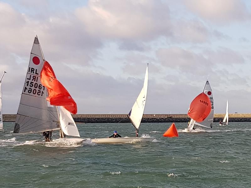Noel Butler and Stephen Oram (FB 15061) gybe and engage with the Laser just ahead of them during the Dun Laoghaire Motor Yacht Club Frostbite Series photo copyright Neil Colin taken at Dun Laoghaire Motor Yacht Club and featuring the Fireball class