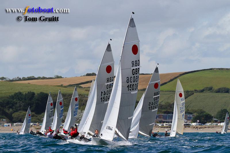 Action from the Fireball National Championships photo copyright Tom Gruitt / www.fotoboat.com taken at Pentewan Sands Sailing Club and featuring the Fireball class