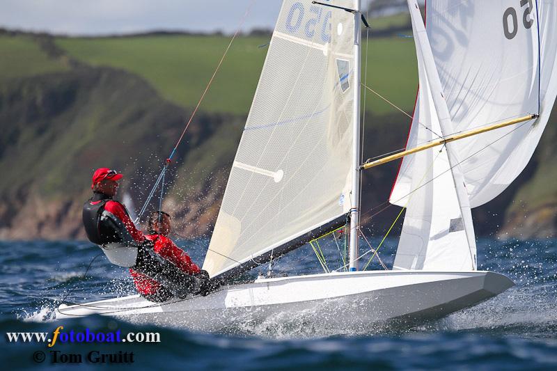 Action from the Fireball National Championships photo copyright Tom Gruitt / www.fotoboat.com taken at Pentewan Sands Sailing Club and featuring the Fireball class