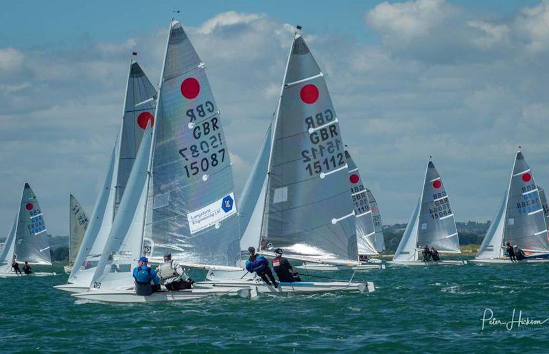 Fireballs at Chichester Harbour Race Week photo copyright Peter Hickson taken at Hayling Island Sailing Club and featuring the Fireball class