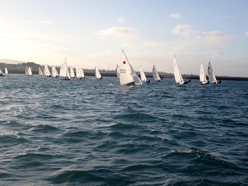 The PY fleet on the first beat of the first race as Dun Laoghaire Frostbite Series 2 gets underway - photo © Cormac Bradley