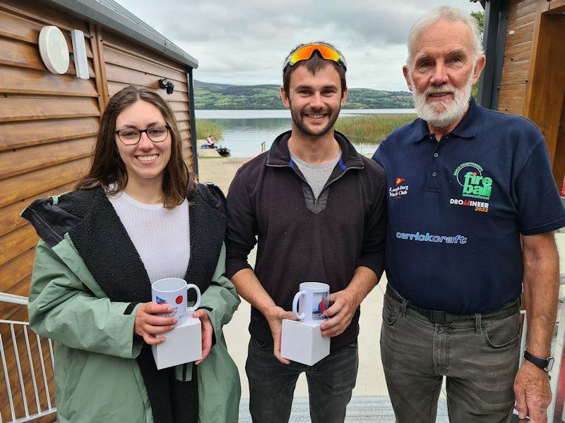 Chara McDowell and Josh Porter take second overall (pictured with organiser Jim Ryan) in the 2022 Fireball Munster Championships at Killaloe - photo © Frank Miller