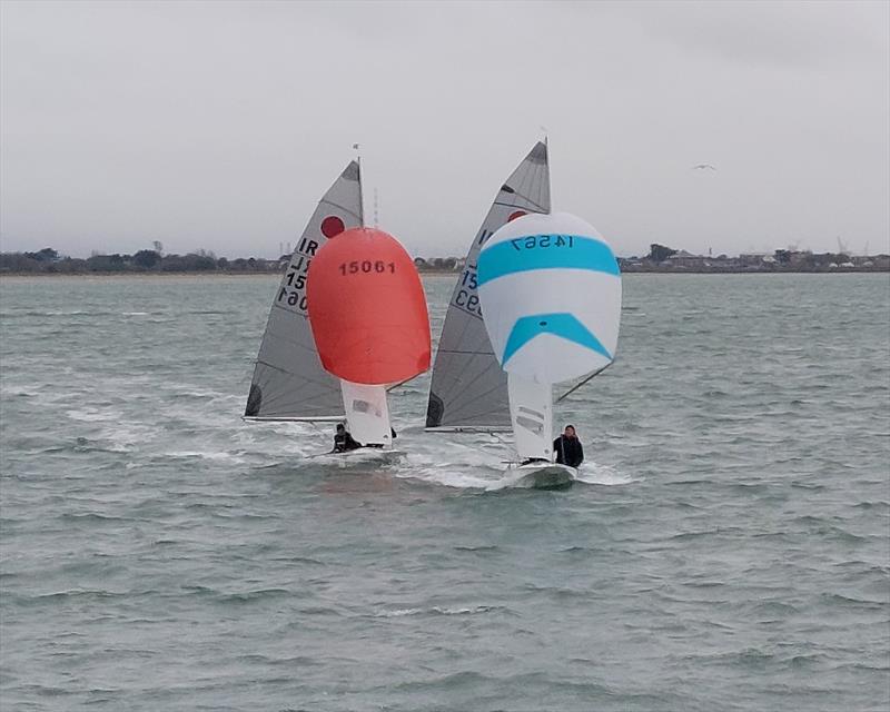 Butler & Greer (left) and Evans & Draper under spinnaker during the Irish Fireball End of Season Championship at Howth photo copyright Neil Murphy / HYC taken at Howth Yacht Club and featuring the Fireball class