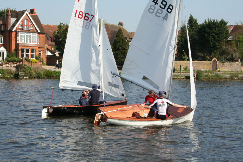 Event winners, Mark Tait and Sally Wakefield in the 59 year old F498 Dido sail past Steve Greaves and Amy Morris in F1867 during the Thames Firefly weekend photo copyright Caroline Vines taken at Thames Sailing Club and featuring the Firefly class
