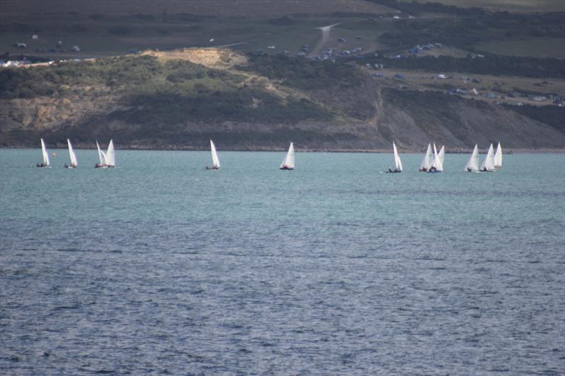 The fleet across the bay during the GJW Direct Firefly nationals in Weymouth photo copyright Patrick Clarke taken at Weymouth Sailing Club and featuring the Firefly class