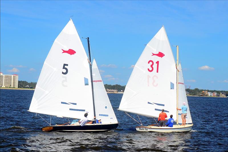 David (DJ) Johnson (#5) Helen Welch and David Richards won the 2021 Fish Class World Championship Regatta in a 15-point tie with Tom Pace (#27) Brandon Addison and Stuart McMillan. Seven races were sailed photo copyright Talbot Wilson taken at Pensacola Yacht Club and featuring the Fish Class class