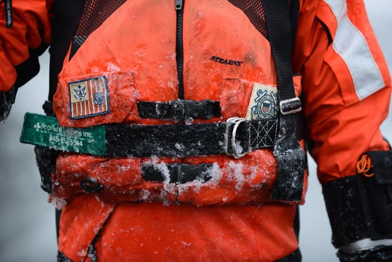 Ice forms on the gear of an ice rescue team member, Wednesday, January 11, 2017, in Burlington, Vermont. Team members wear multiple layers of thermal clothing and a dry suit in order to stay warm while working in freezing temperatures photo copyright Petty Officer 3rd Class Andrew Barresi taken at  and featuring the Fishing boat class