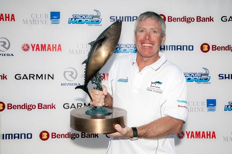 Riviera Port Lincoln Tuna Classic overall winner Ian Montgomery, who caught 19 fish, proudly hold's this year's tournament trophy photo copyright Riviera Studio taken at  and featuring the Fishing boat class
