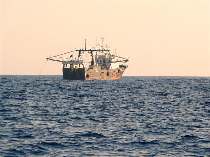 A fishing vessel North East of the tip of Brazil photo copyright Global Solo Challenge taken at  and featuring the Fishing boat class