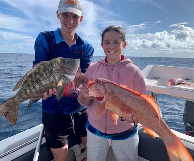 The Bartlett's are doing what they do best and extracting quality reef fish like this sweetlip and coral trout - photo © Fisho's Tackle World